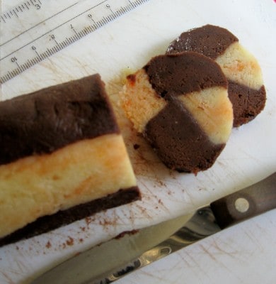 slicing-orange-and-chocolate-cookie-dough-before-baking